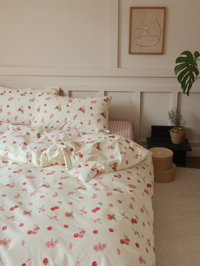 Ivory Cherry Floral Cotton Bedding Set – front view of the softly draped cherry-print duvet - Roomden