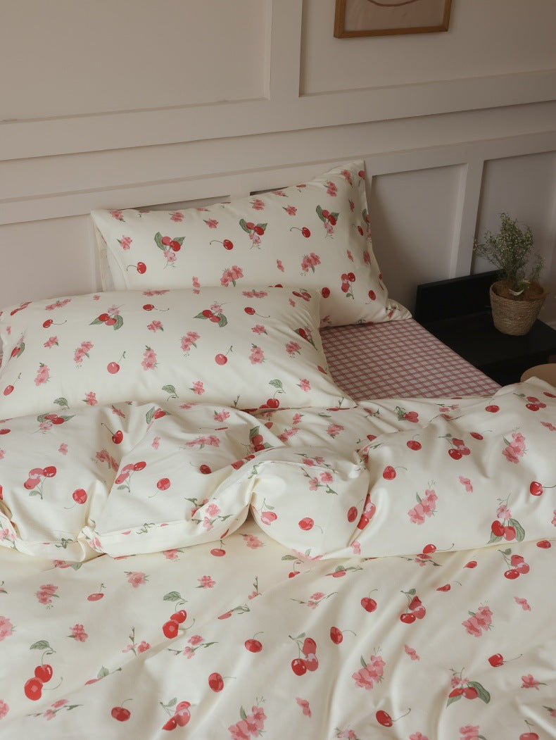 Ivory Cherry Floral Cotton Bedding Set – close view of cherries and small pink flowers - Roomden
