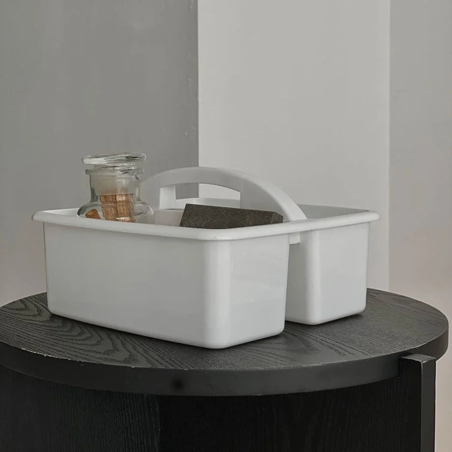 Close-up shot of the minimalist white ABS storage caddy. - RoomDen