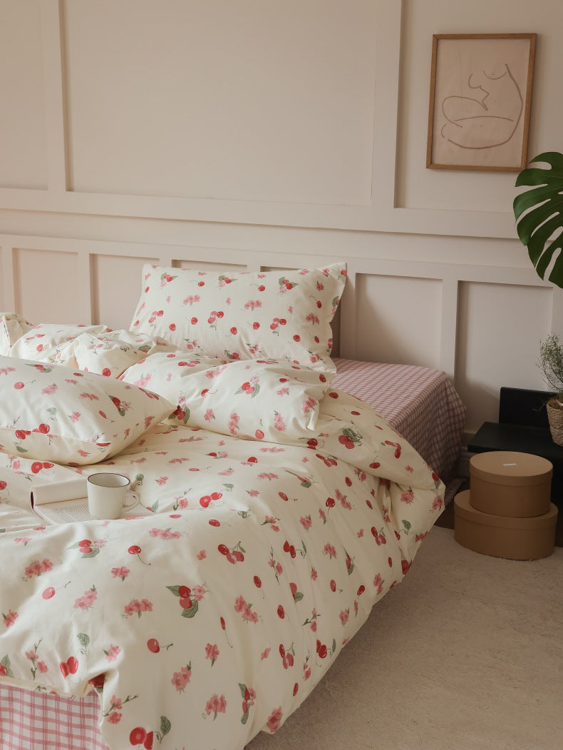 Ivory Cherry Floral Cotton Bedding Set – three-quarter view of the cherry-print bed - Roomden