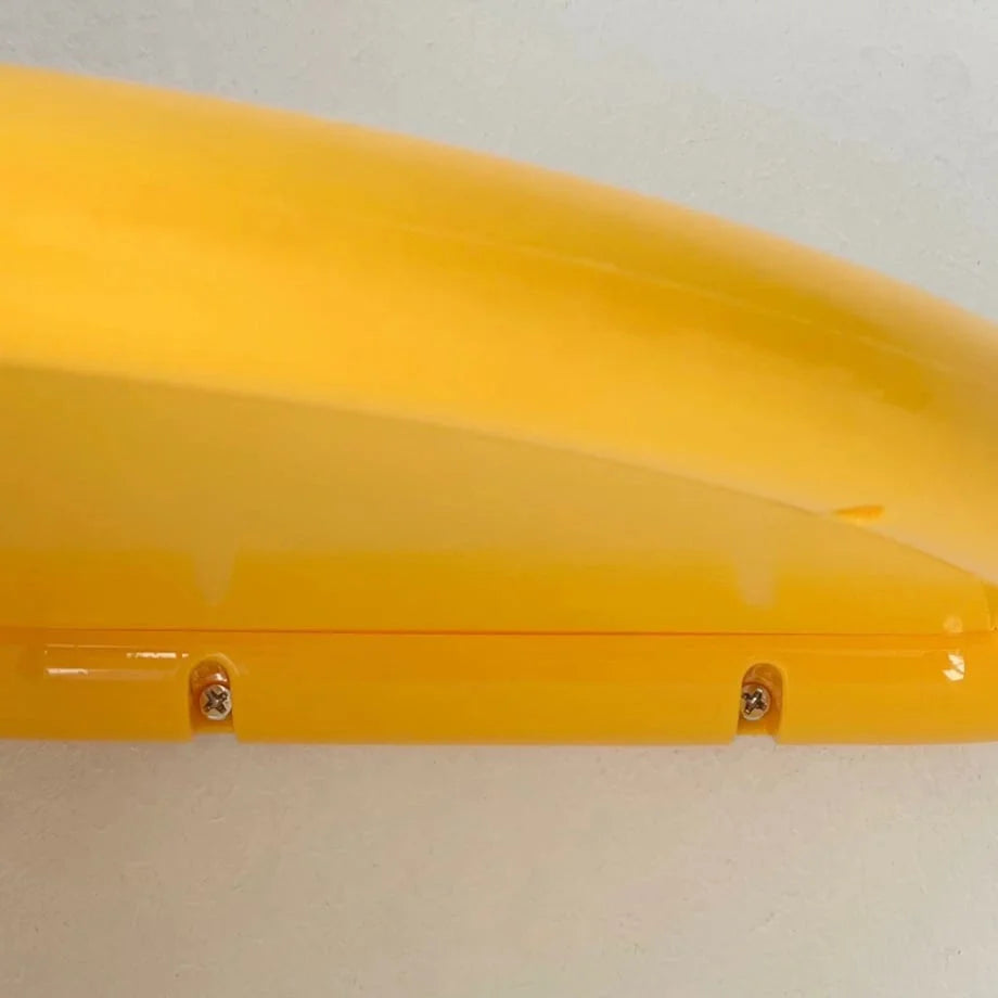 Underside view of the yellow corner shelf showing the integrated screw holes for drilled installation. - RoomDen
