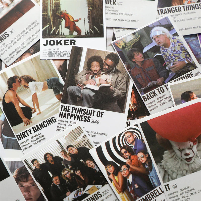 Eclectic mix of retro movie poster prints from a wall collage kit for a rental bedroom - RoomDen