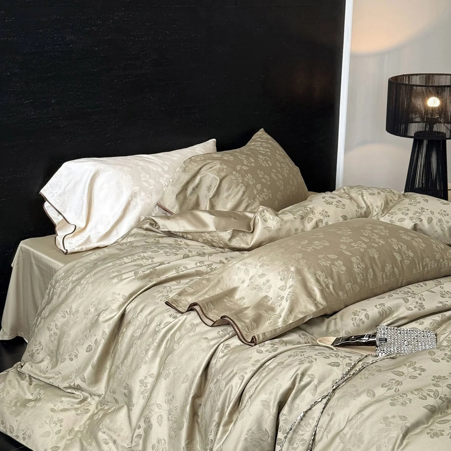 Full view of the Khaki Green silky floral jacquard cooling Tencel bedding set on a bed, styled in a sophisticated, modern bedroom. - RoomDen