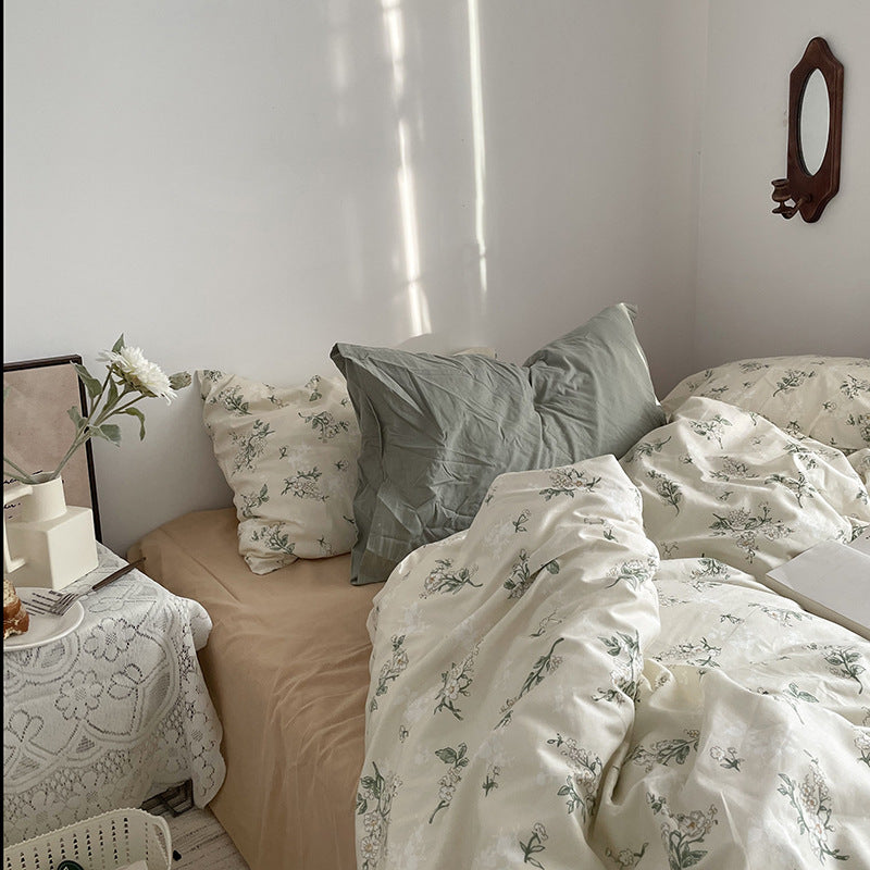 Florhaven Gardenia Sprig cotton bedding set – sunlit botanical bedding with muted green pillows - Roomden