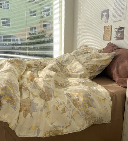 The vintage floral bedding set illuminated by sunlight streaming through window blinds, showcasing its soft, crinkled texture. - RoomDen