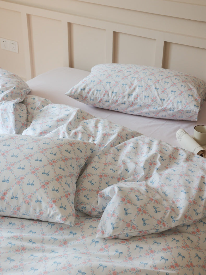 Ivory Blue Bow Rose Cotton Bedding Set – close view of pink rose clusters and blue bows - Roomden