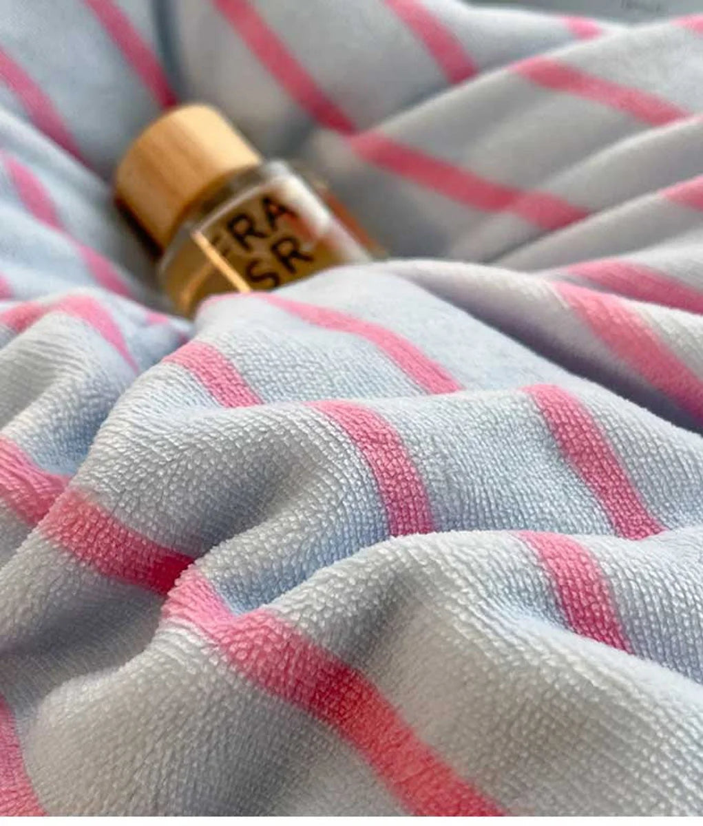 Macro shot of the soft, textured material of the Bubblegum Pink striped flannel fleece bedding. - RoomDen