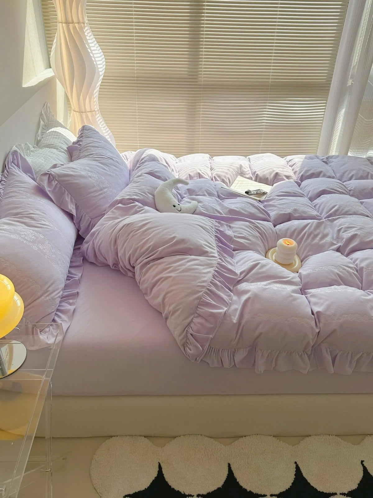 Full view of the Lavender Ruffled Velvet Bedding Set in a bright, sunlit bedroom. - RoomDen