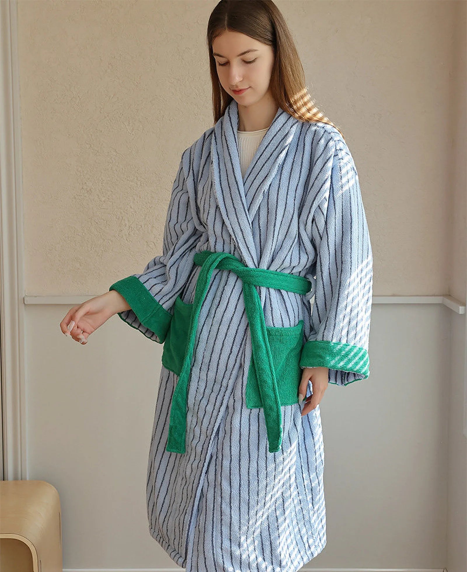 Full body shot of the blue striped robe showing the fit and drape.