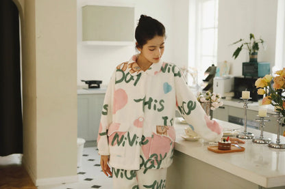 Model Wearing Cute Ruffled Collar Fleece Pajama Looking Down - RoomDen