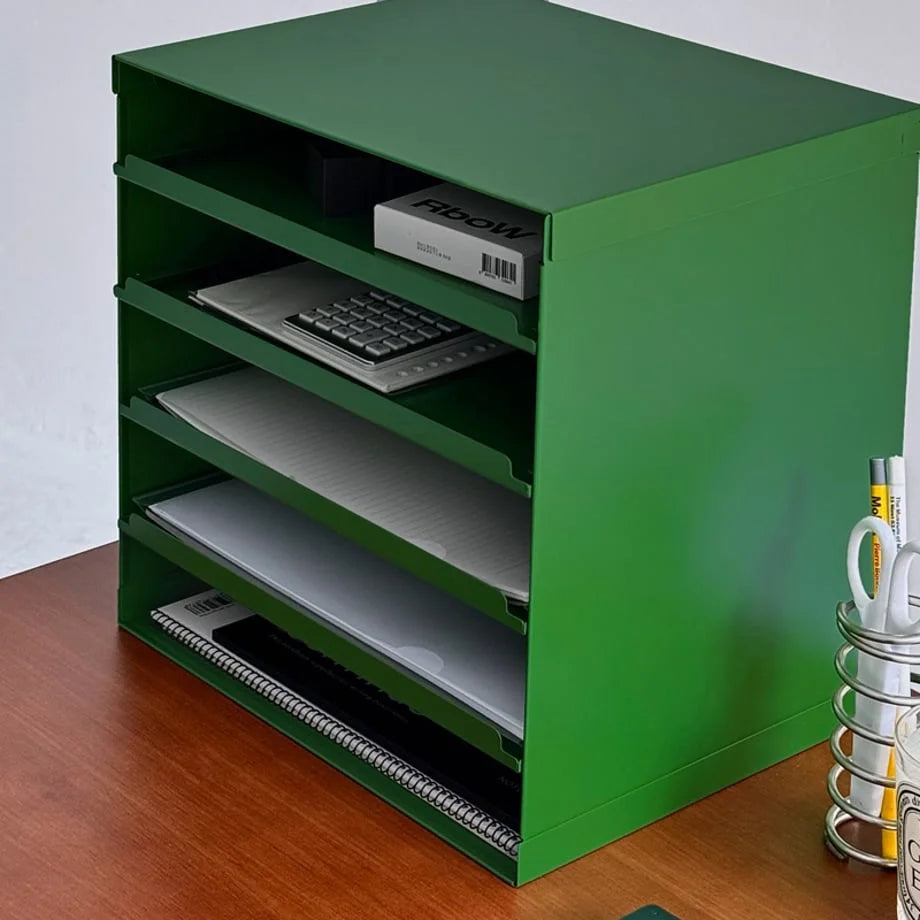 Angled close-up view of the Kelly Green desktop organizer's shelves and contents - RoomDen.