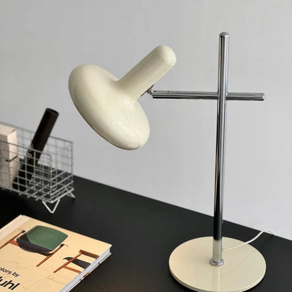 Side profile of the Cream and Chrome Accent Lamp showing its elegant form and power cord.