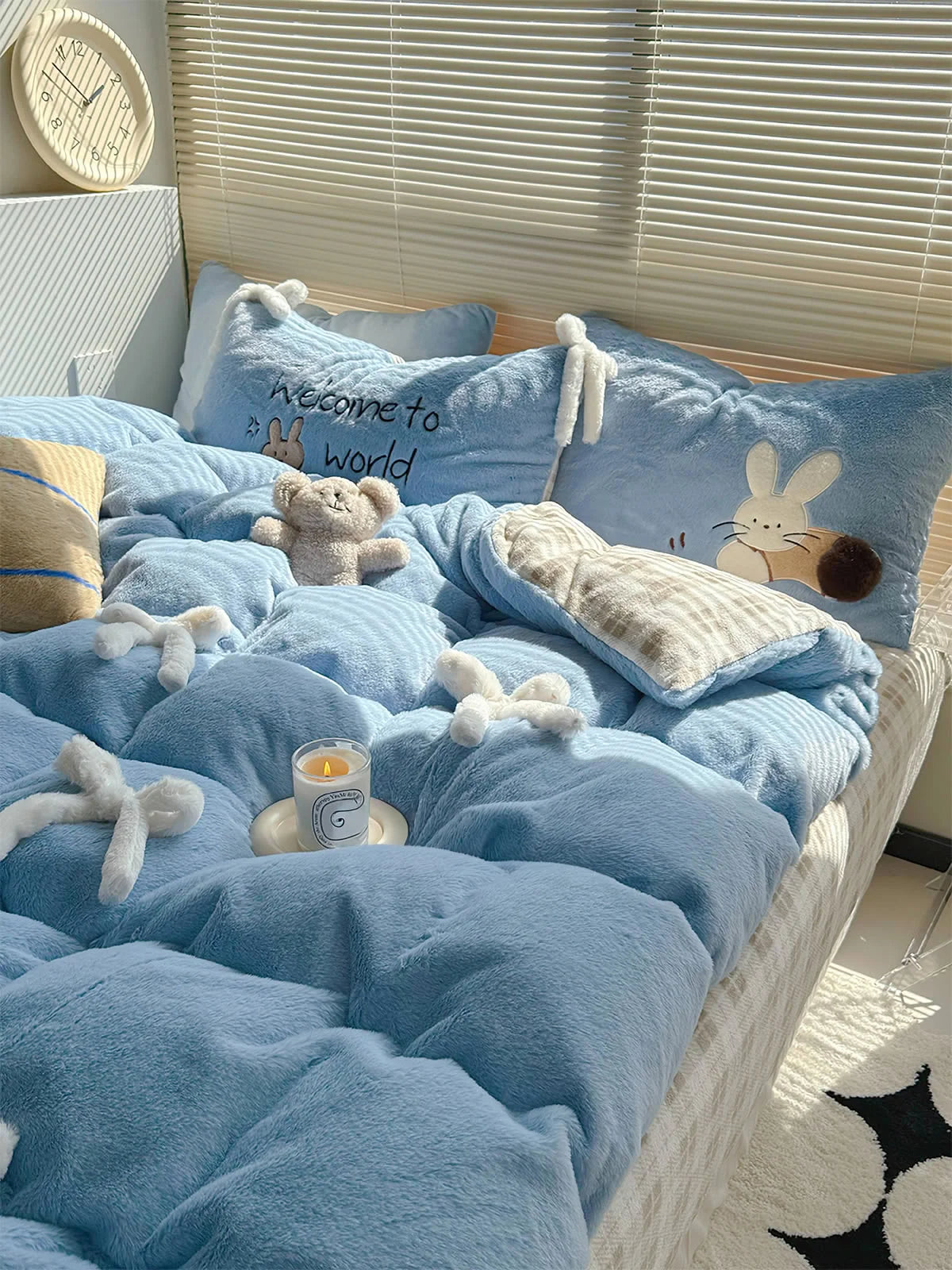 Main image of the Baby Blue Bunny flannel fleece bedding set in a sunlit room. - RoomDen