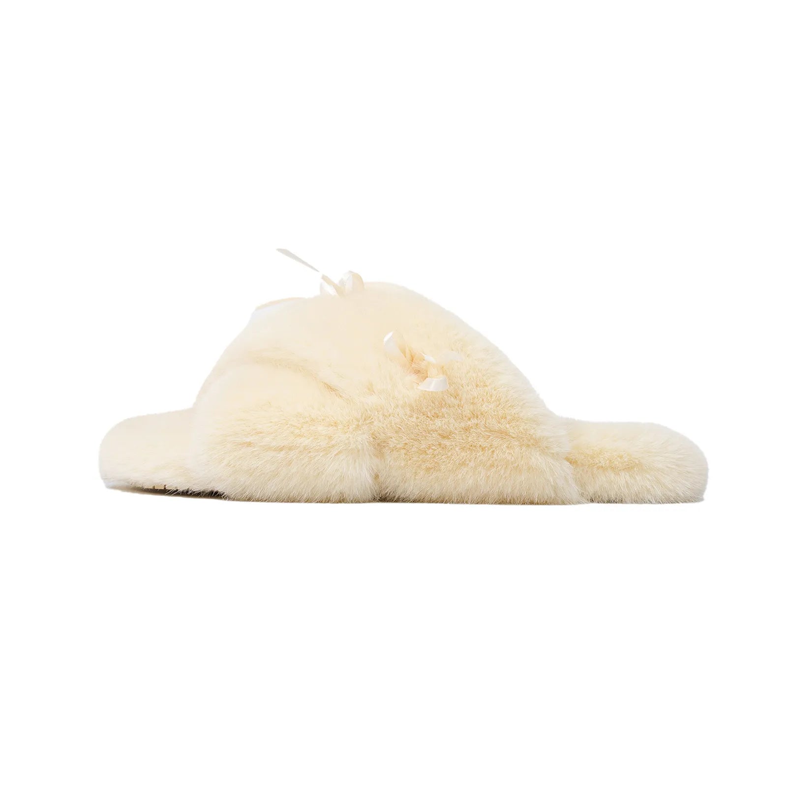 Side profile of butter yellow plush slipper with satin bow - RoomDen