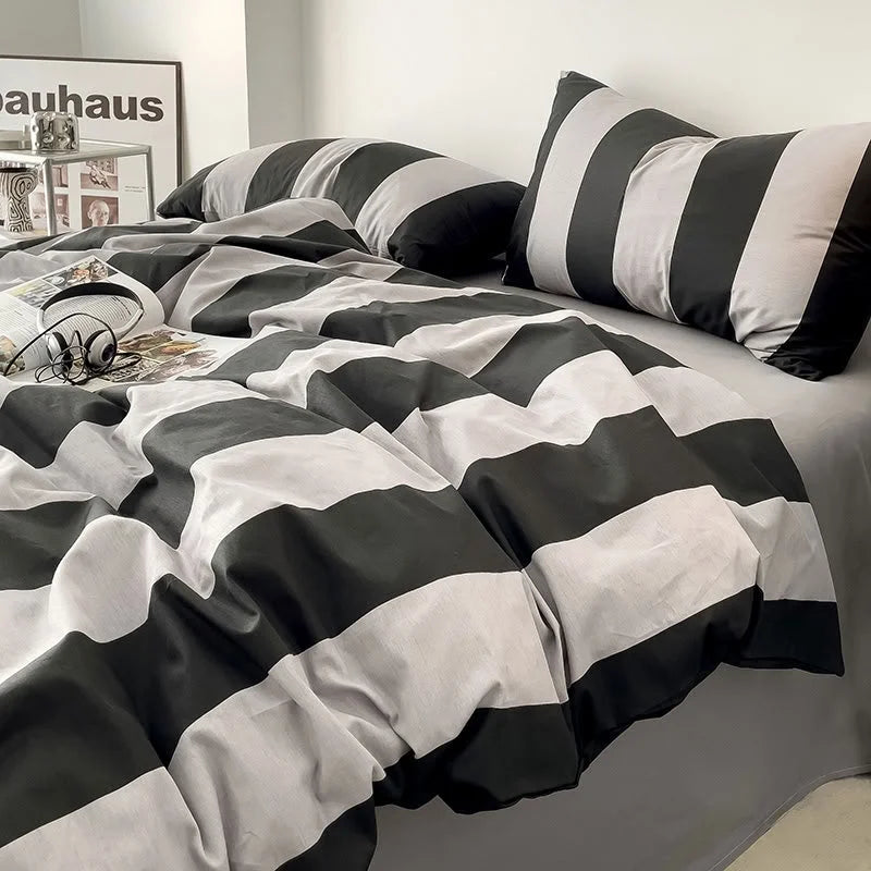 Side angle of the Black & Grey Striped Bedding Set showing the texture of the washed cotton fabric - RoomDen