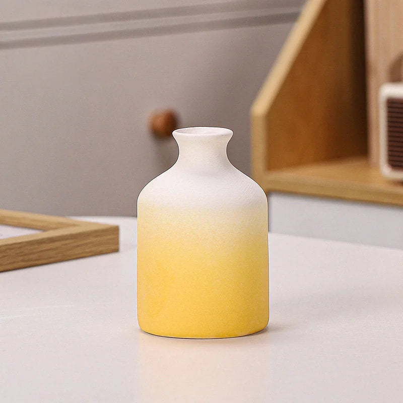 Yellow Ombre bottle-shaped frosted ceramic vase on a white surface - RoomDen.
