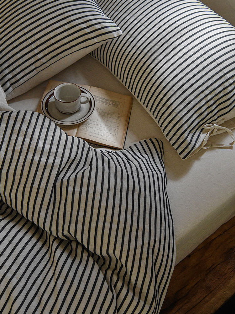 Ashfield Black Pinstripe Bedding Set – Close-up of black pinstripe fabric folds - Roomden