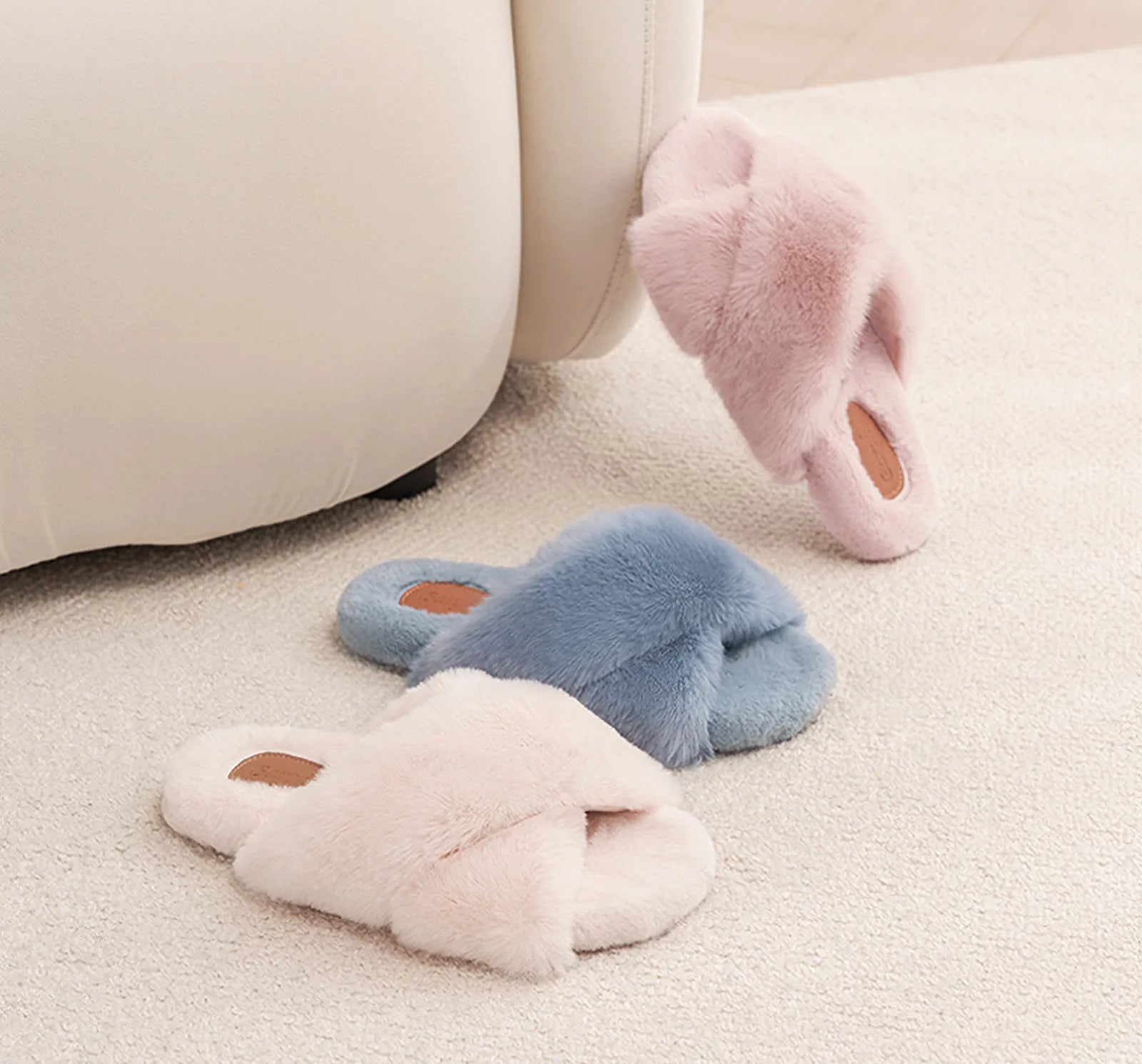 Group shot of pink blue and beige faux fur cross-band slippers - RoomDen