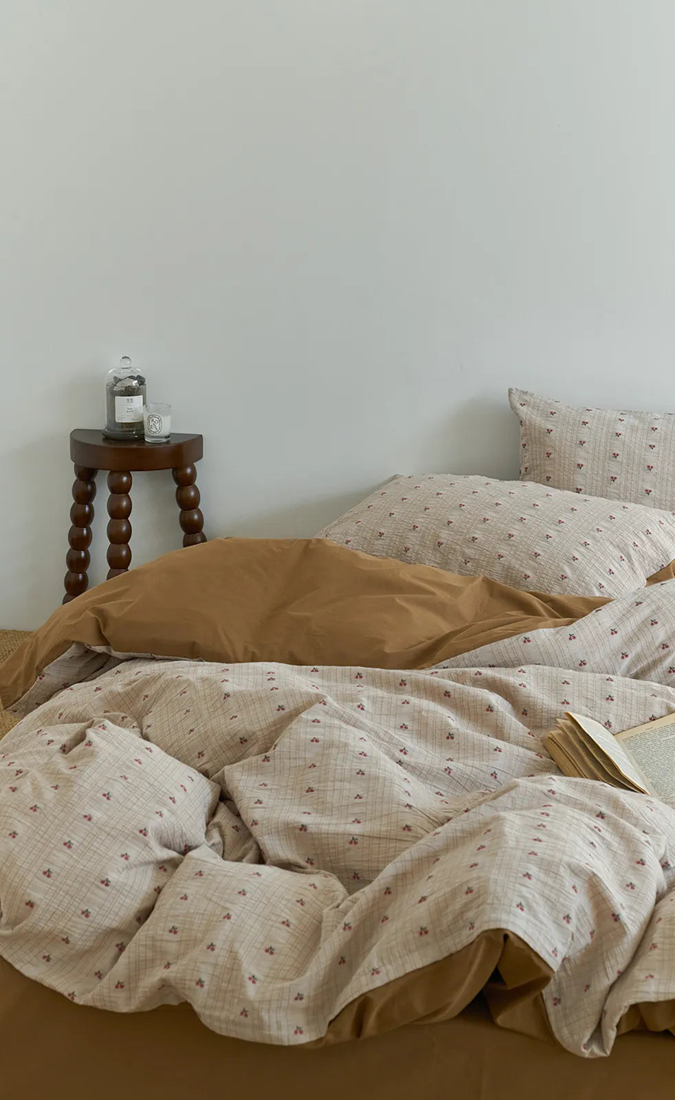 Full view of the bed with the Ditsy Cherry Washed Cotton Bedding Set, showcasing its soft, crinkled texture - RoomDen.