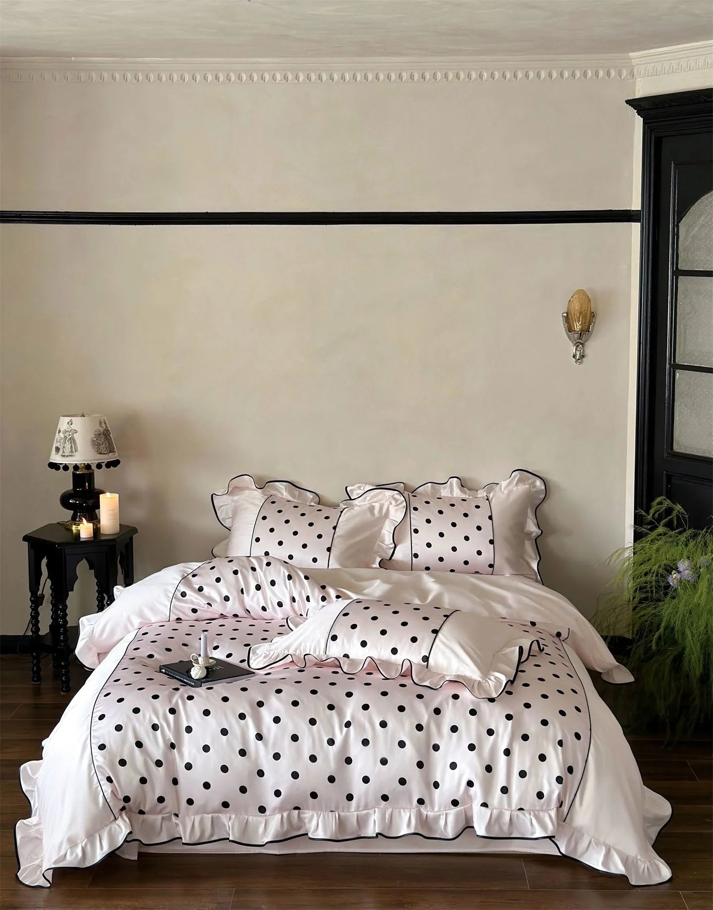 Full view of the Blush Pink & Black Polka Dot Tencel Bedding Set on a bed, showing the color variant - RoomDen.