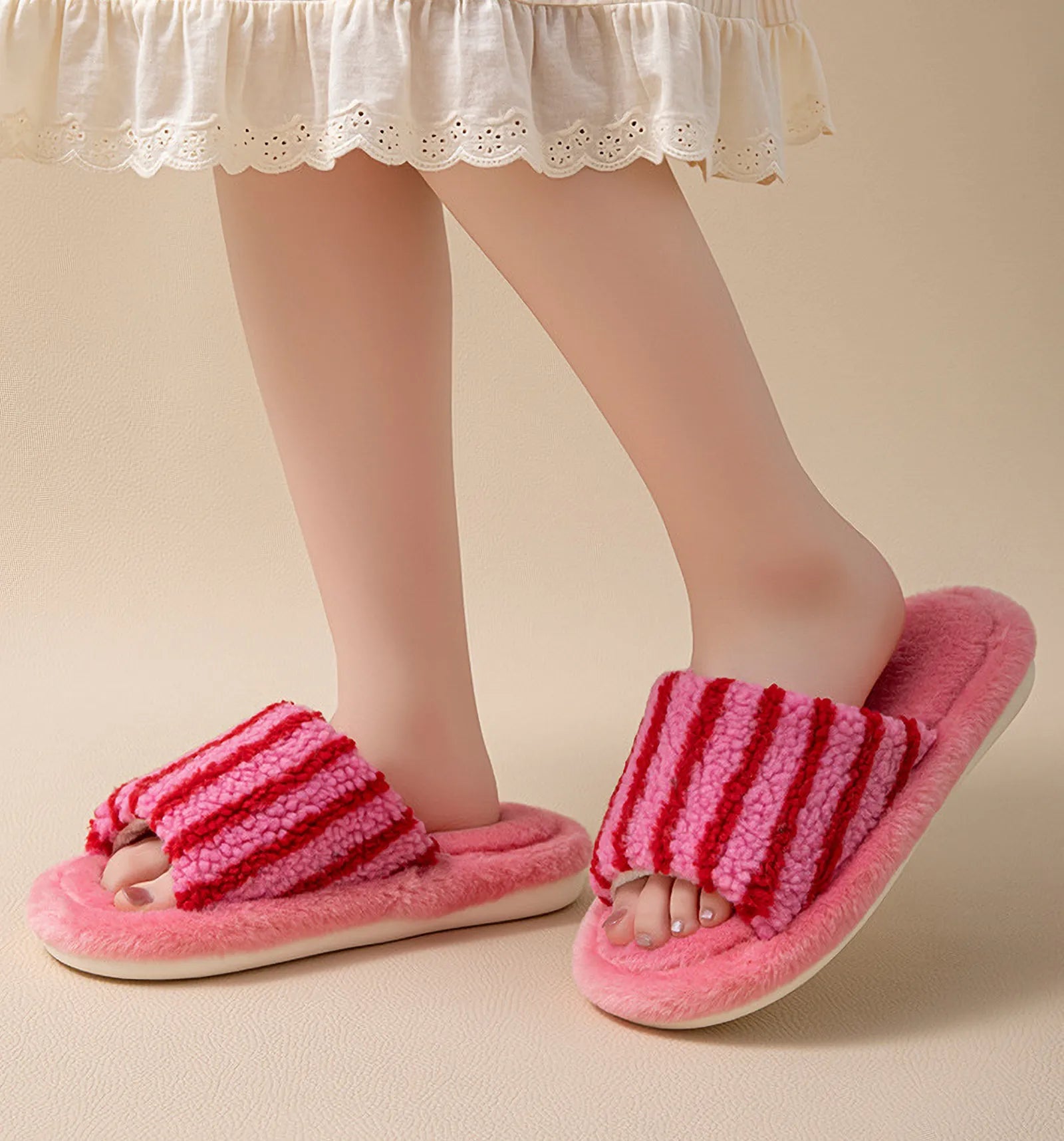 Woman wearing Pink and Red striped fuzzy slides with white skirt - RoomDen