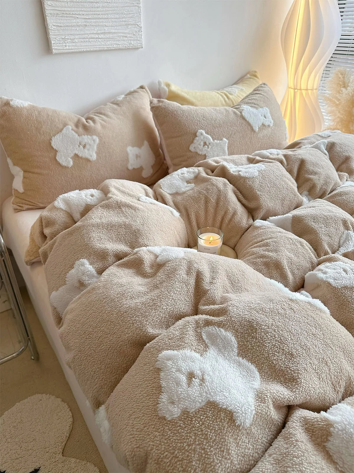 Close-up of the thick, plush texture of the creamy beige flannel fleece duvet cover with white teddy bear patterns. - RoomDen