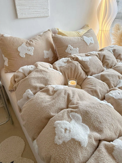 Close-up of the thick, plush texture of the creamy beige flannel fleece duvet cover with white teddy bear patterns. - RoomDen