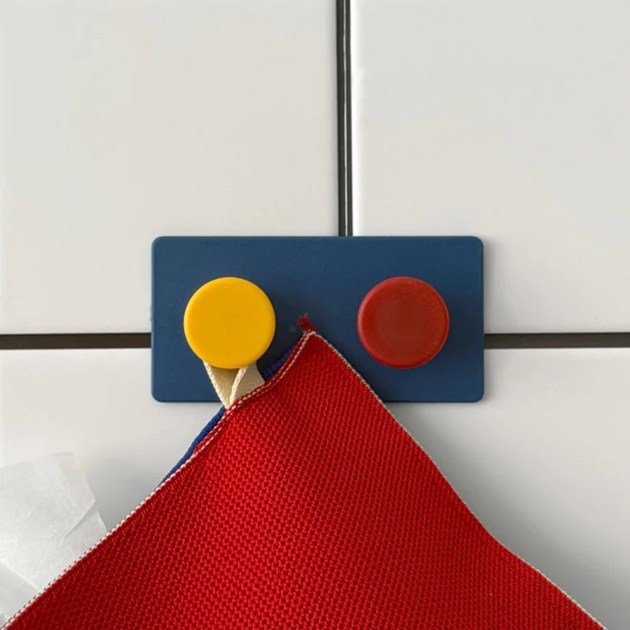 Front view of the Blue Colorblock Decorative Hook holding a towel, showcasing its playful aesthetic in a bathroom setting - RoomDen.