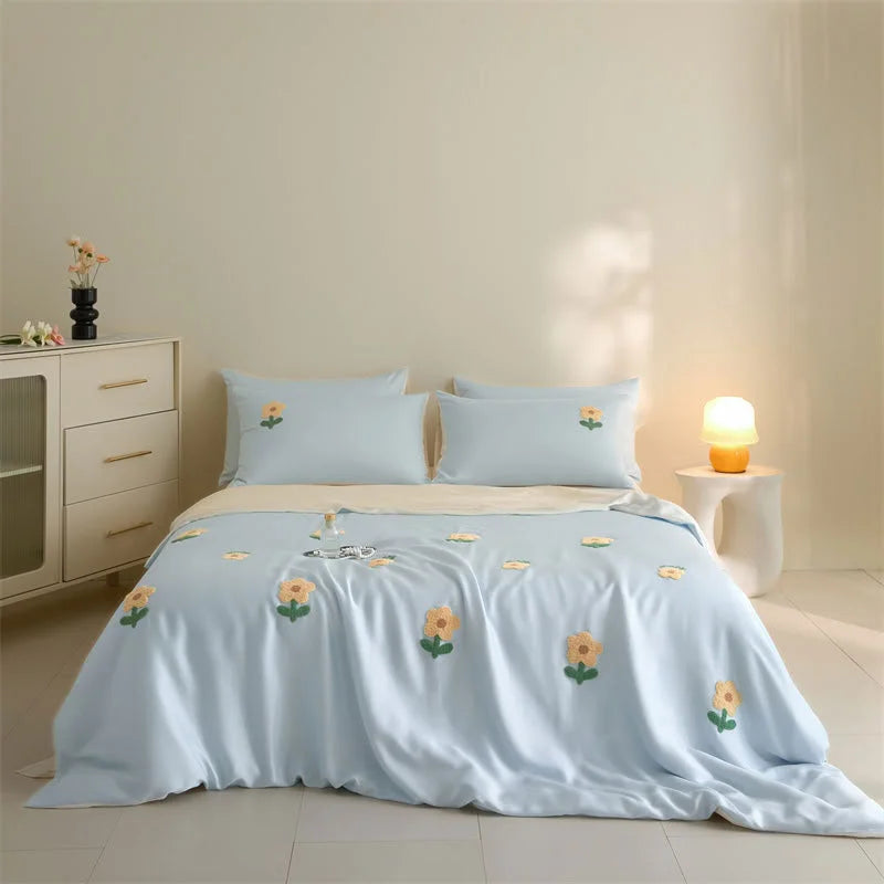 Pastel Blue variant of the Tufted Doodle Flower Tencel Bedding Set on a bed. - RoomDen