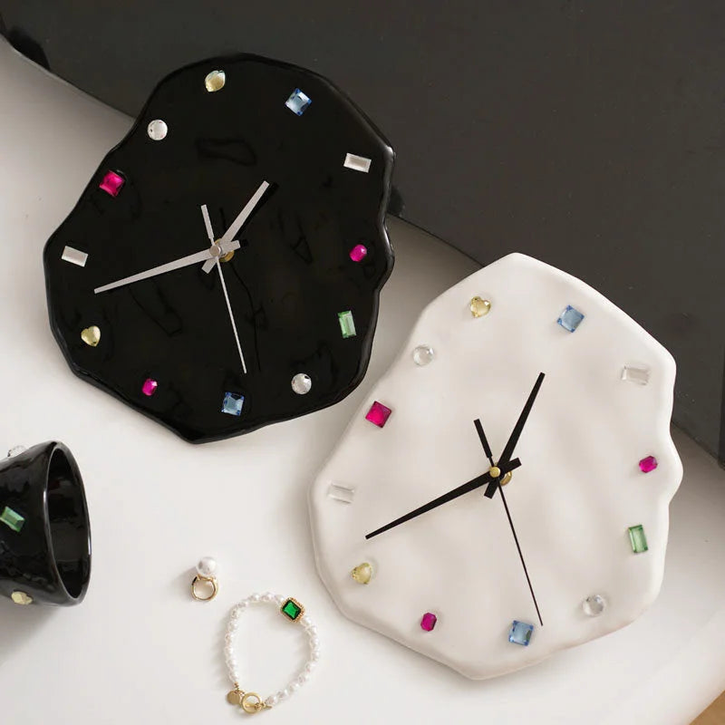 Overhead view of the black and white Wavy Jeweled Ceramic Clocks with jewelry accents - RoomDen