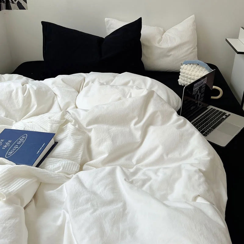 White Bedding Set with Laptop and Mug on Bed - Dorm Style