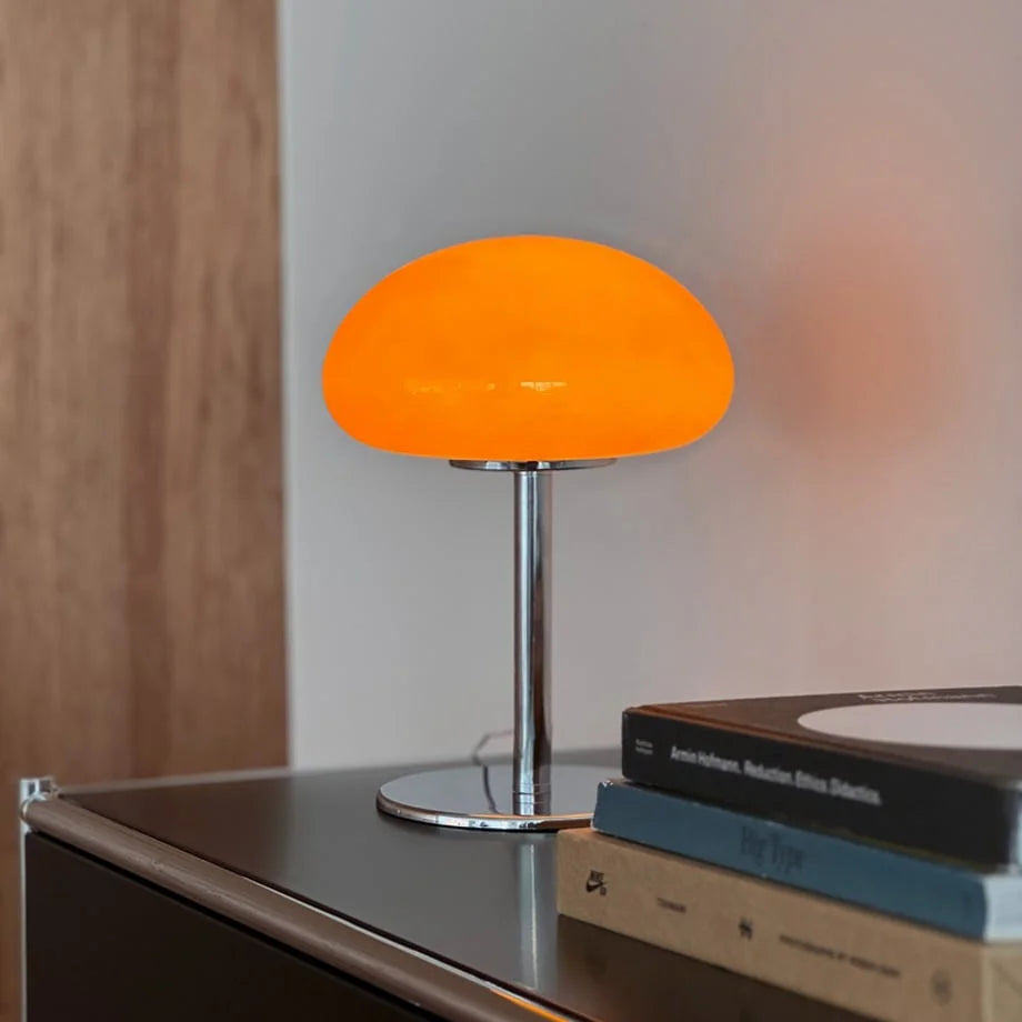 Detailed shot of the glossy orange dome shade of the mushroom accent lamp - RoomDen.