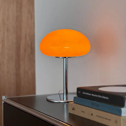 Detailed shot of the glossy orange dome shade of the mushroom accent lamp - RoomDen.
