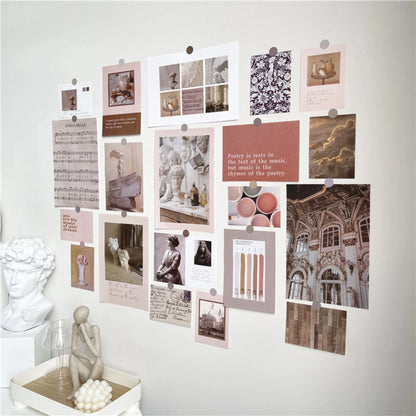 The full Dark Academia wall collage kit arranged neatly, with a David bust sculpture adding to the aesthetic.