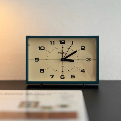Front view of the Forest Green Retro Table Clock's face and hands.