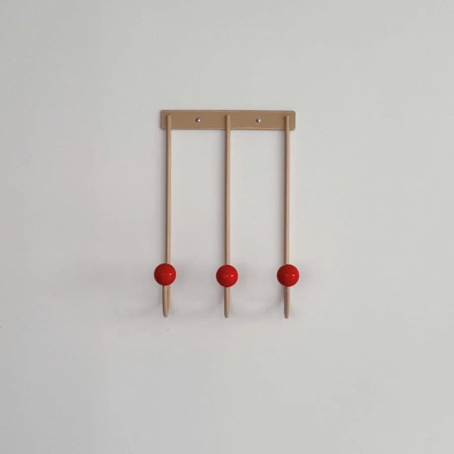 A clean, centered product shot of the Beige & Red Color Block Metal Wall Hooks on a white background. - RoomDen