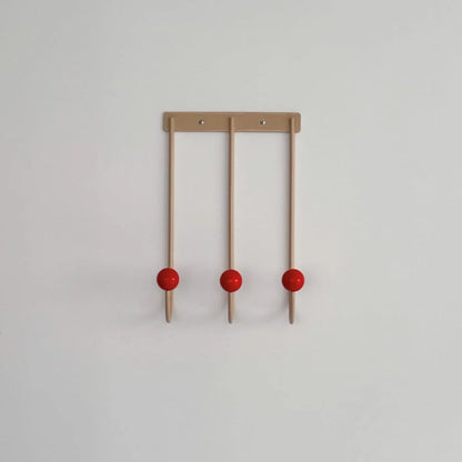 A clean, centered product shot of the Beige & Red Color Block Metal Wall Hooks on a white background. - RoomDen