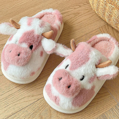 Close-up detail of Pink and White Cow Print slipper showing cute embroidered eyes and soft ears - RoomDen.