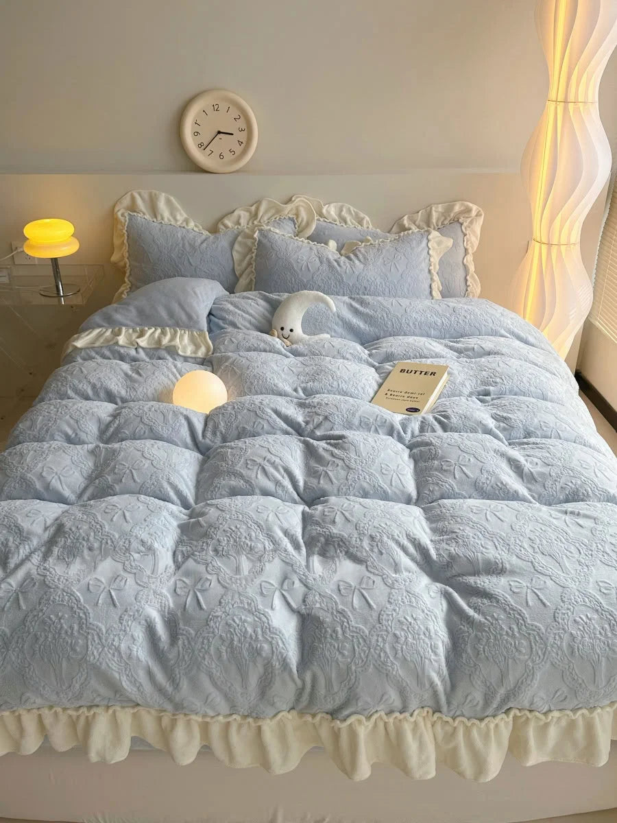 Full bed view of the Powder Blue Ruffled Flannel Fleece Bedding Set, styled with a book in a serene bedroom - RoomDen.