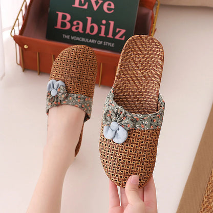 Hand holding Sage Green Floral Natural Rattan House Slipper - RoomDen