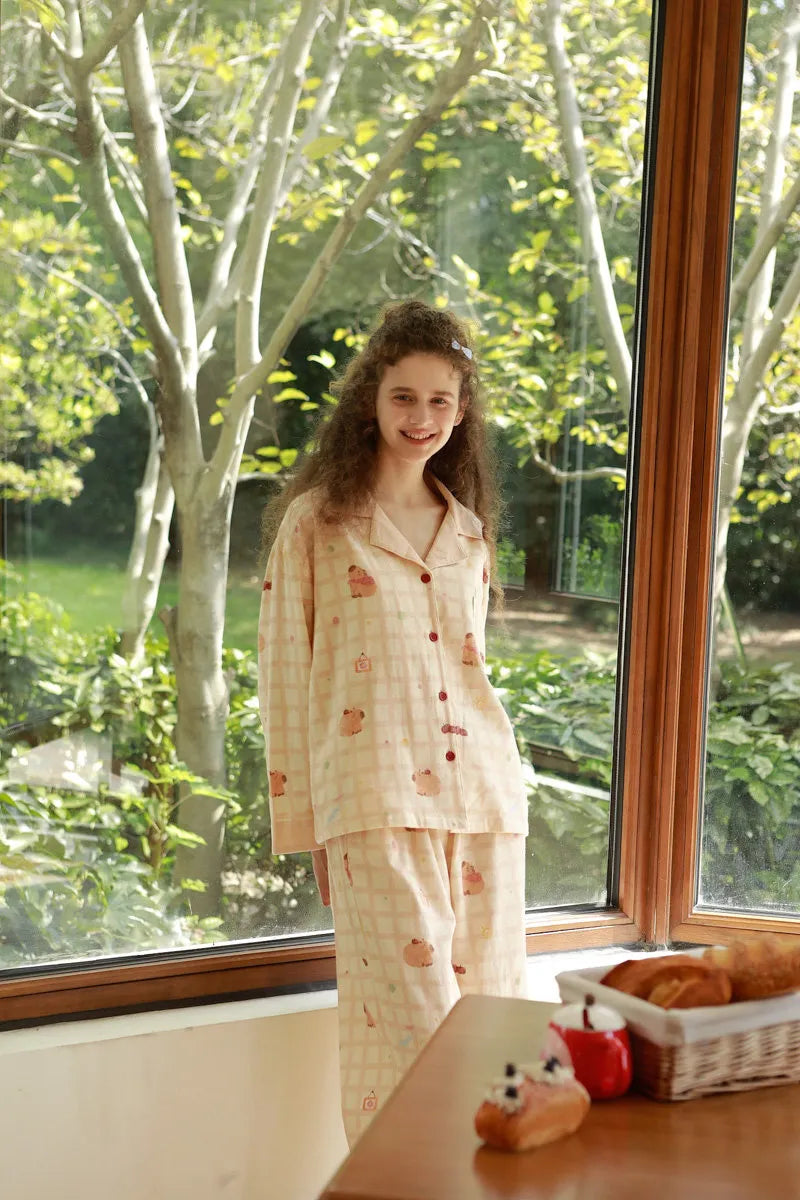 Full Body Shot of Relaxed Fit Pajama Set with Capybara Pattern by Window