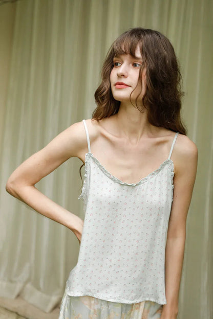 Model wearing Sage Green Cotton Sateen Pajama Set posing indoors - RoomDen
