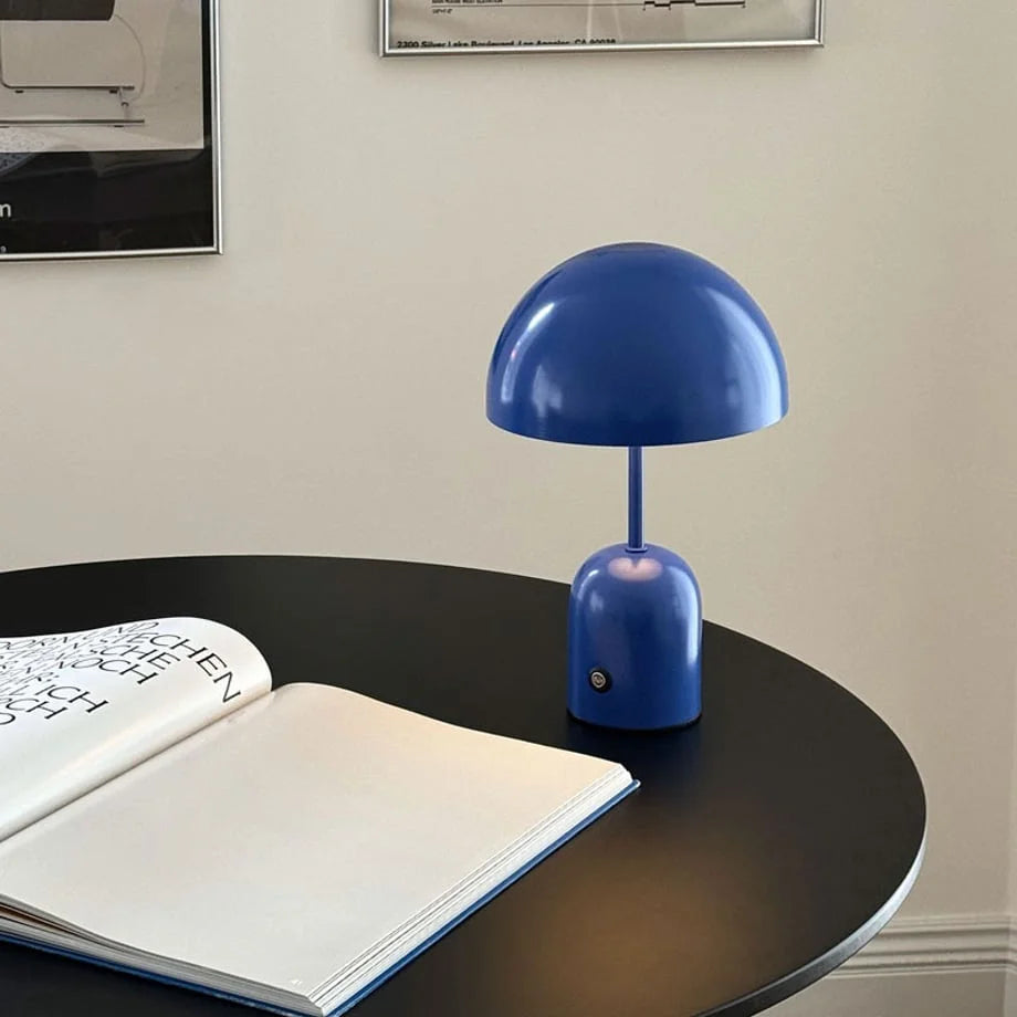 Lifestyle scene featuring the Cobalt Blue cordless lamp, creating a studious and modern vibe - RoomDen