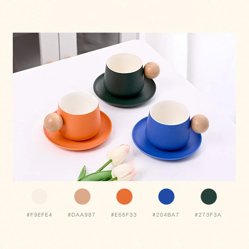 An overhead view of Frosted Ceramic Mug Sets in Dark Green, Orange, and Blue with a color palette swatch below. - RoomDen