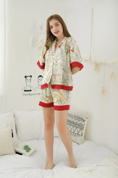 RoomDen Silky Festive Berry Botanical Cotton Sateen Pajama Set - Short Sleeve Model Standing Pose - Christmas Mood