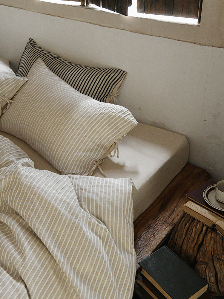 Ashfield Ivory Pinstripe Bedding Set – Close view of layered pinstripe pillows - Roomden