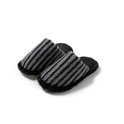 Pair of Black and Grey striped plush slippers showing black faux fur lining and sole - RoomDen