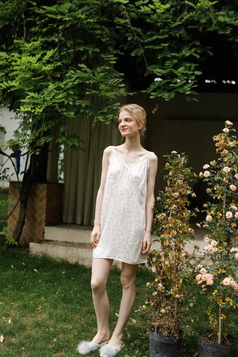 Full length view of vintage style white floral slip dress for summer