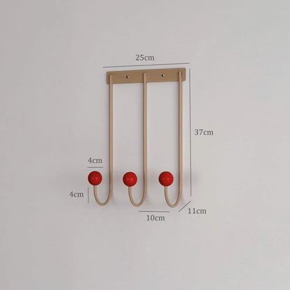 A diagram showing the dimensions of the metal wall hooks: 37cm height and 25cm width. - RoomDen