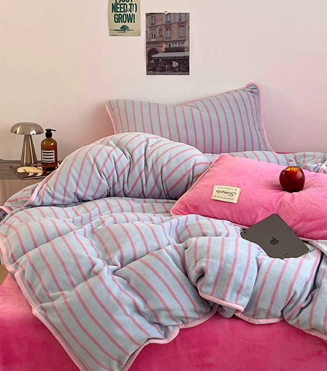 Angled view of the Bubblegum Pink bedding set, highlighting the soft and puffy duvet cover. - RoomDen